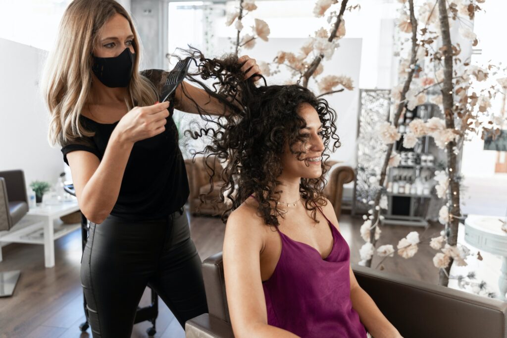 Hairdresser and client in a beauty salon